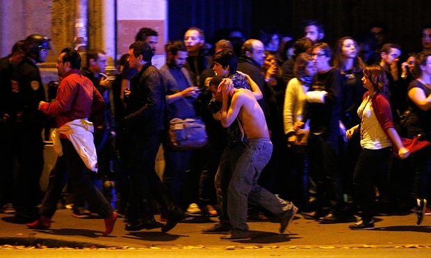ounded people are evacuated outside the Bataclan concert hall. Photograph: Yoan Valat/EPA 