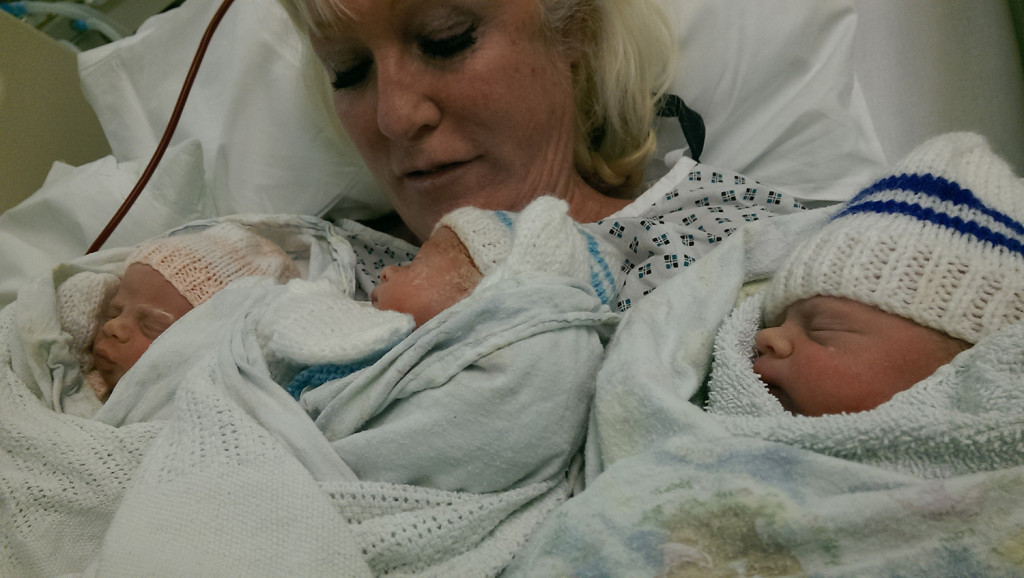 Sharon in the hospital with the triplets.