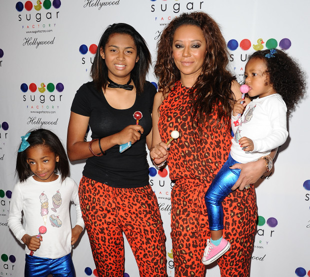 Melanie Brown with daughter, Iris Murphy Brown, Phoenix Chi Gulzar & Madison Brown Belafonte attends the grand opening of Sugar Factory Hollywood on November 13, 2013 in Hollywood, California.